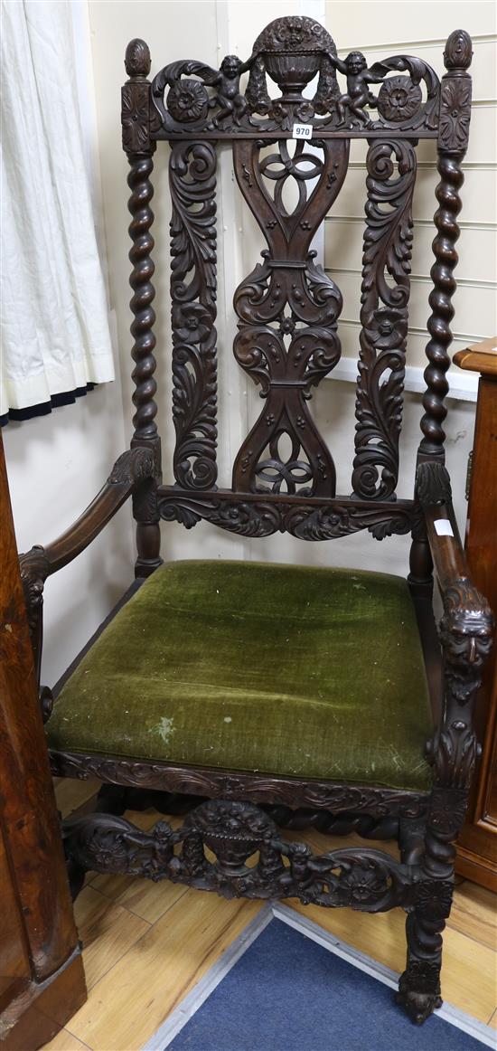 A late 19th century walnut throne chair, with carving matching that on the table selling as Lot 979